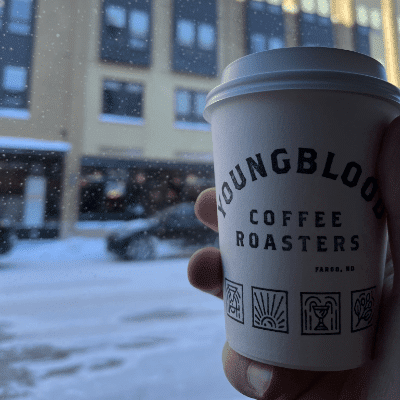 coffee cup from youngblood coffee in downtown fargo